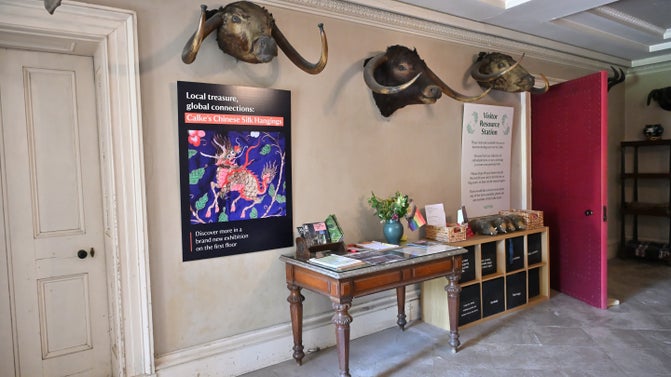 A resource station inside the Entrance Hall of the House at Calke Abbey